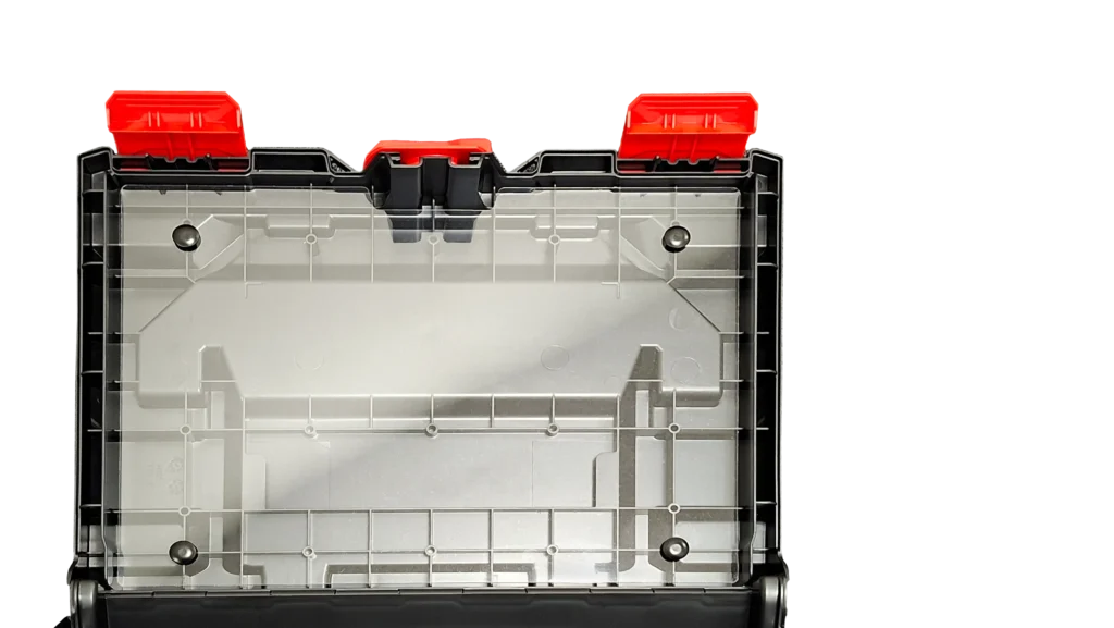 Top view of a transparent plastic storage box with red latches along the lid area, empty inside.