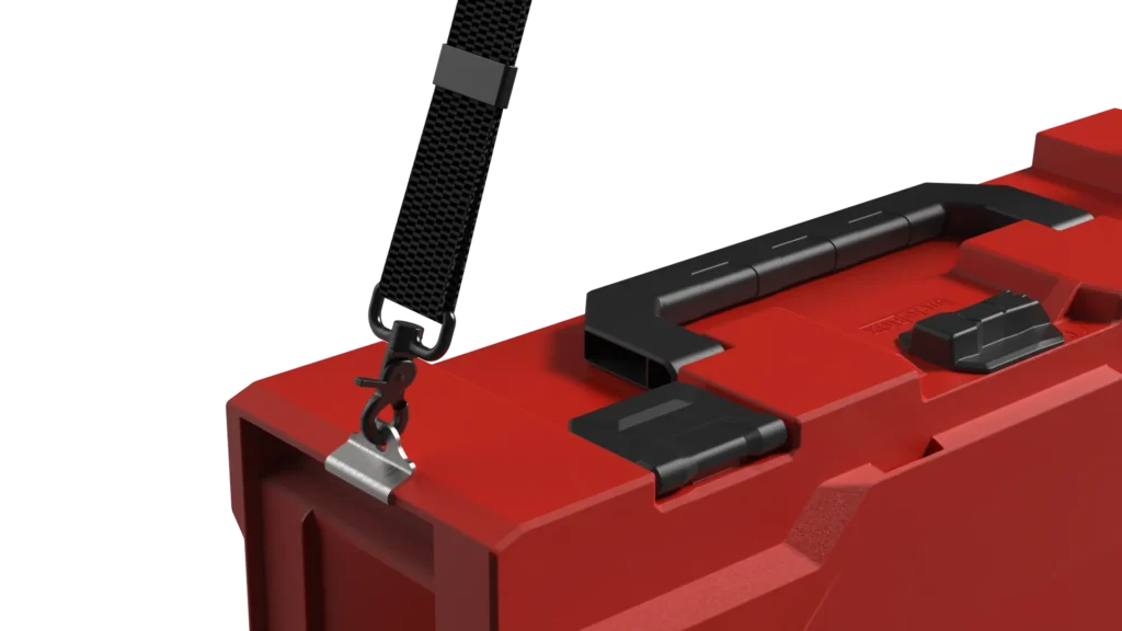 Red plastic toolbox with a black detachable shoulder strap and metal hook at the corner.