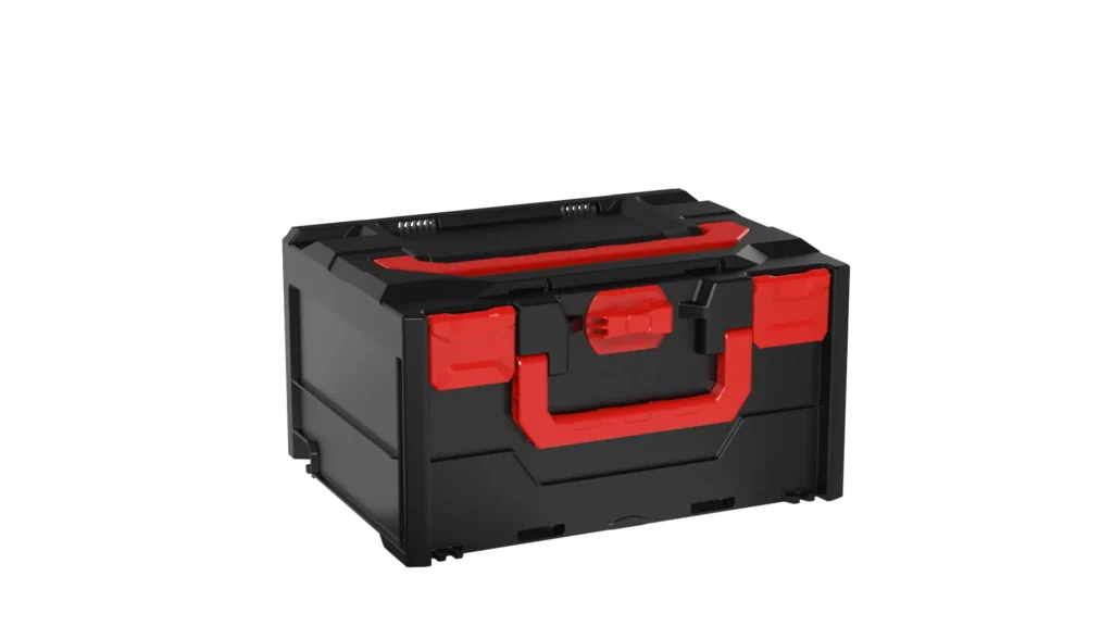 Angled view of a black toolbox with a red handle and red latches on the front.