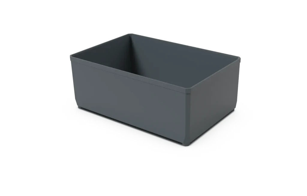 Grey open-top plastic storage bin on a white surface.
